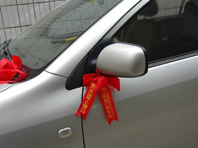 新车红布条要挂多久?